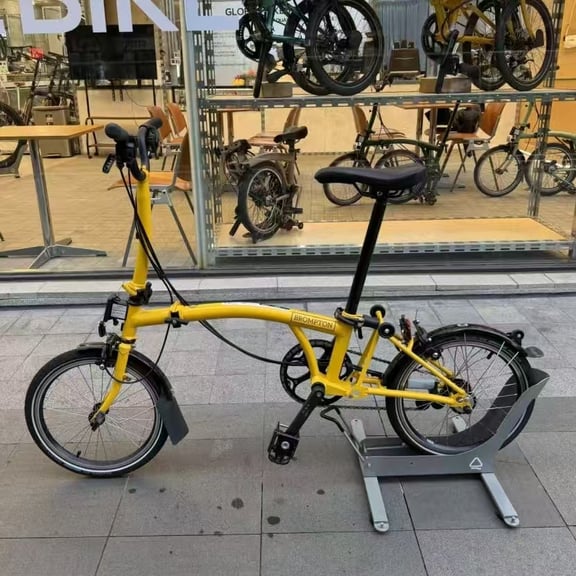Brompton Folding Bike – Yellow rental bike