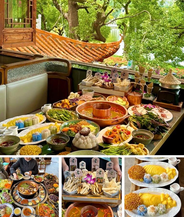 A large spread of colorful Yunnan cuisine on a balcony overlooking a traditional garden.