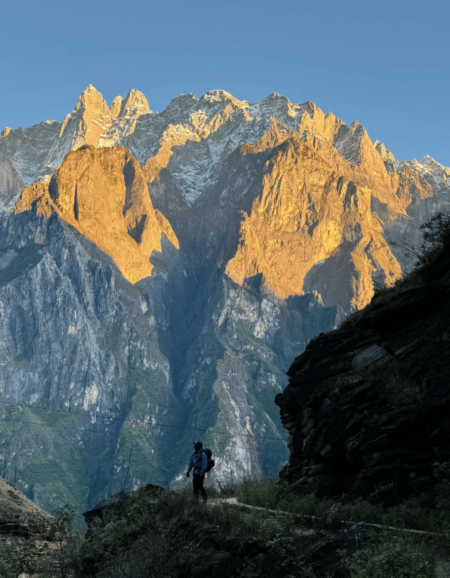 Deep gorge carved between Yulong and Haba Snow Mountains with the Jinsha River far below.